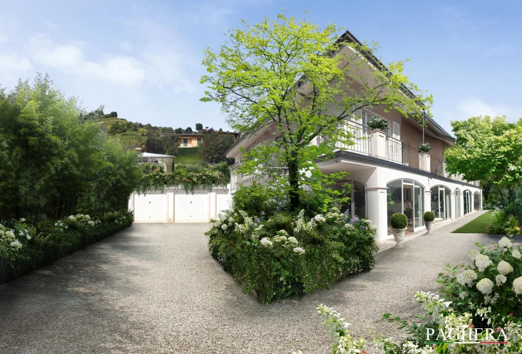 Villa tra bianche fioriture